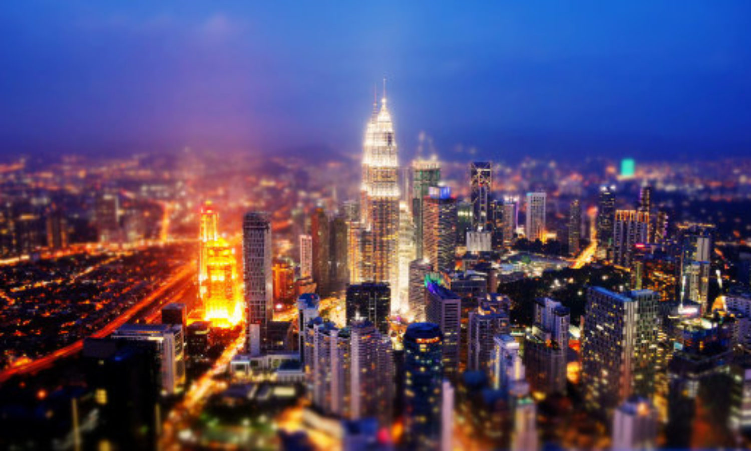 Night time Skyline of Kuala Lumpur in tilt-shift video