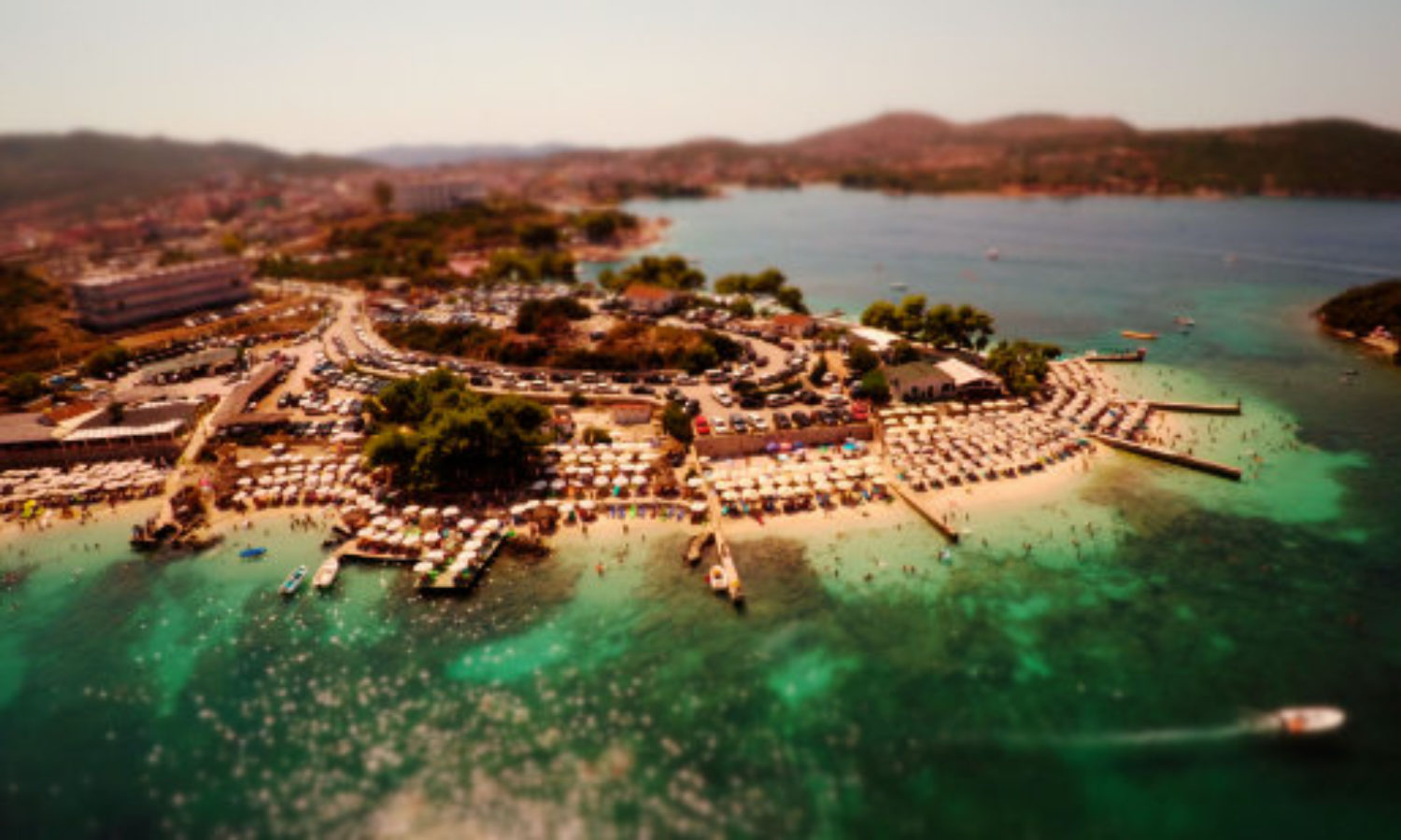 Aerial view of beach in Ksamill, Albania in tilt-shift video