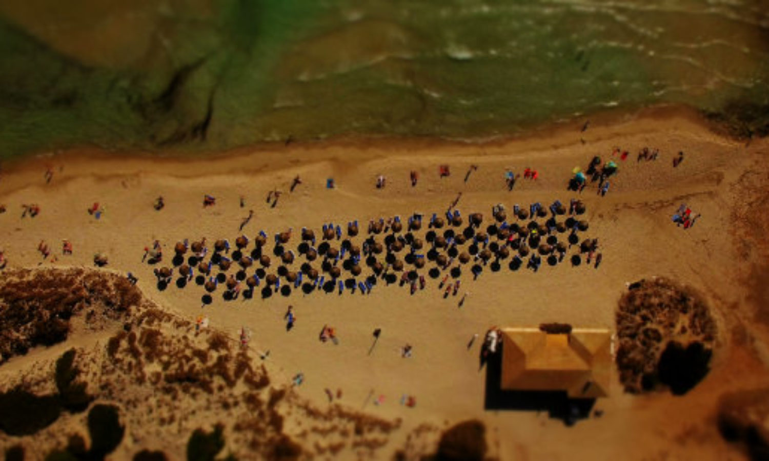 Drone view of beach in Mallorca in tilt-shift video