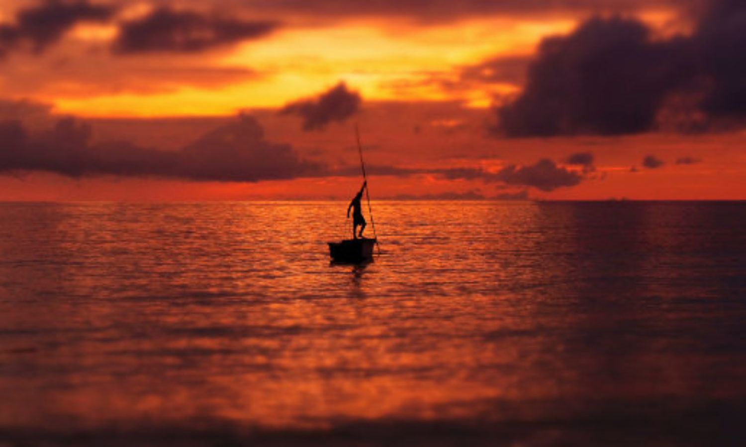 Fisherman in Sunset on Kei islands in tilt-shift video