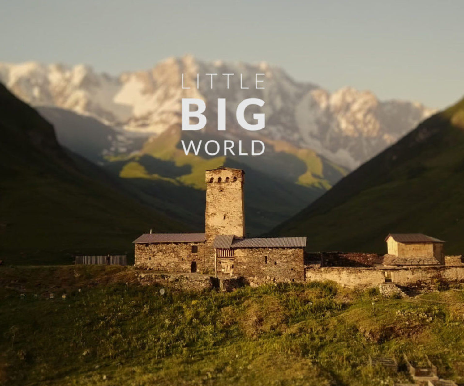 Drone shot in Ushguli - Tilt shift miniature look with Little Big World logo.